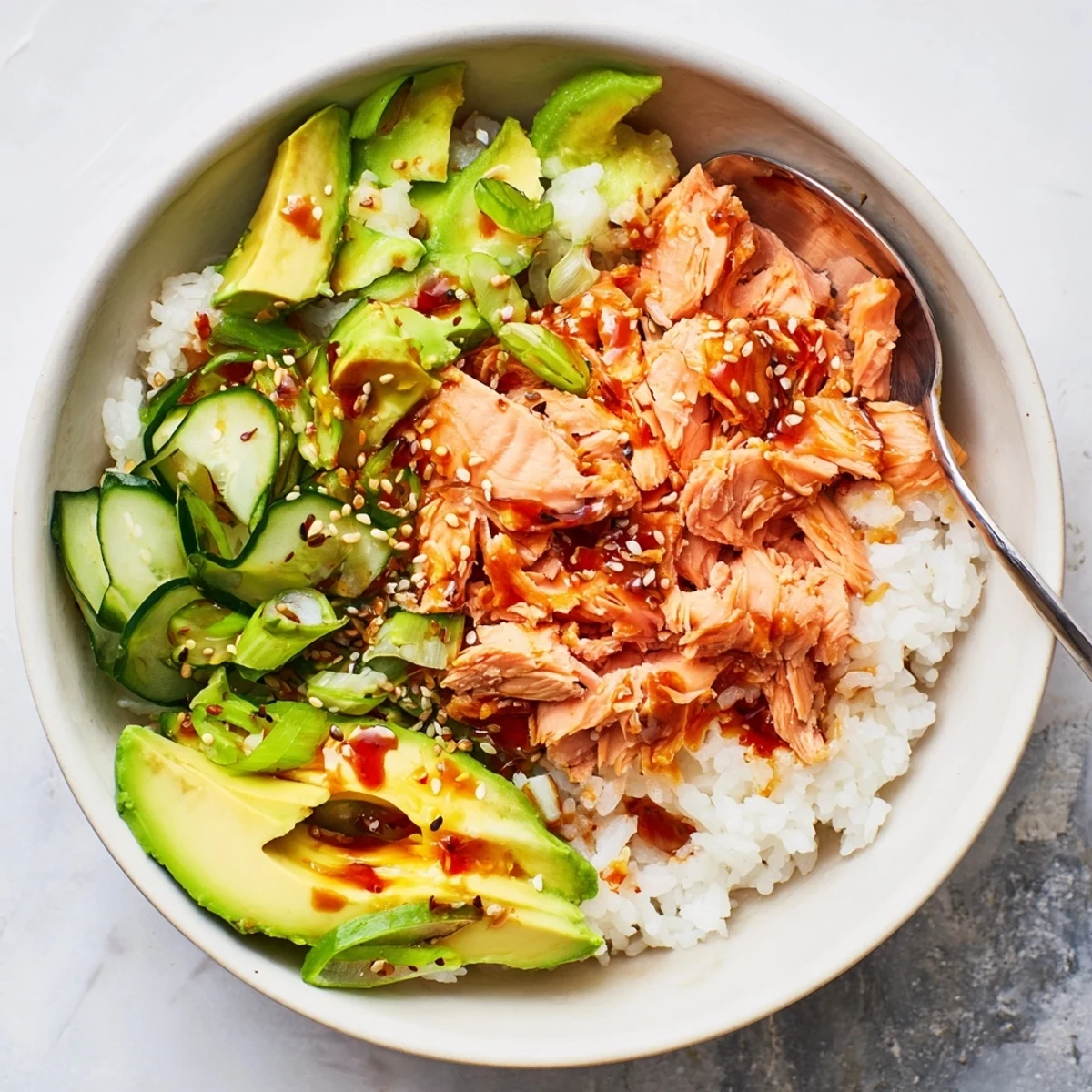 Flavorful leftover salmon and rice bowl, perfect for a quick, nutritious meal.