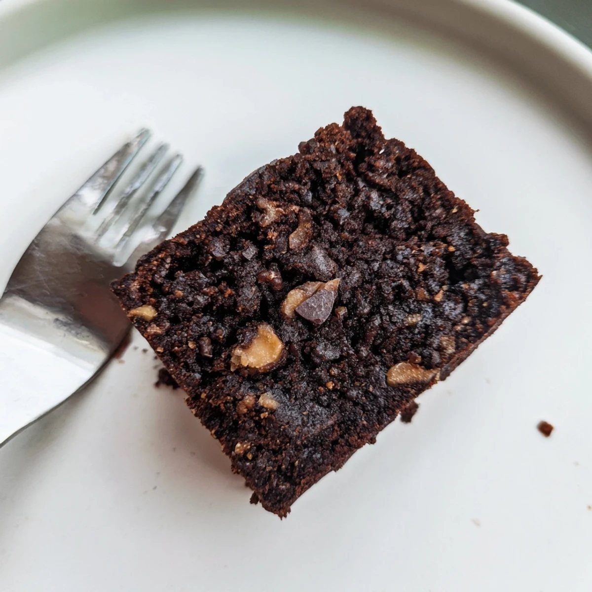 Savory zero-waste brownies combining almond pulp and chocolate; a guiltless treat!