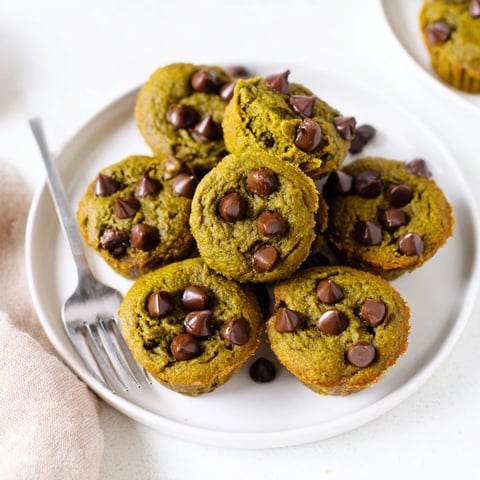 Moist matcha pumpkin chocolate muffin bites ready for a delightful snack experience.