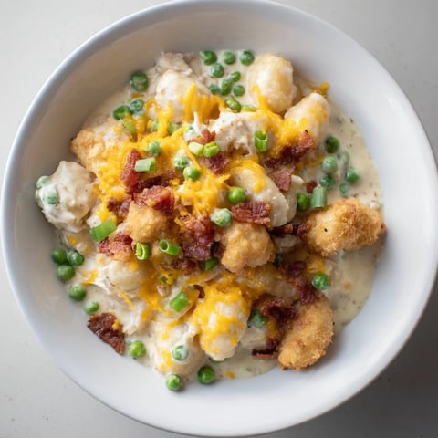 Creamy crack chicken gnocchi simmered in a rich, cheesy sauce, garnished with fresh green onions for dinner.