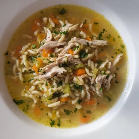 Steaming bowl of Chicken and Ditalini Flu Fighter Soup, perfect for a cozy, comforting dinner.