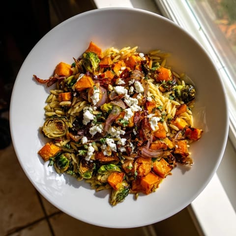 A close-up of the Best Fall Harvest Orzo Salad ready to be enjoyed, full of color and flavor.