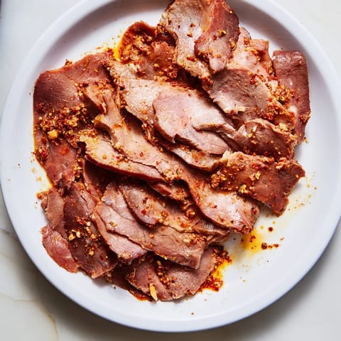 Vibrant photo of spiced Turkish Döner Meat, flavorful and cooked to juicy perfection, ready to enjoy.