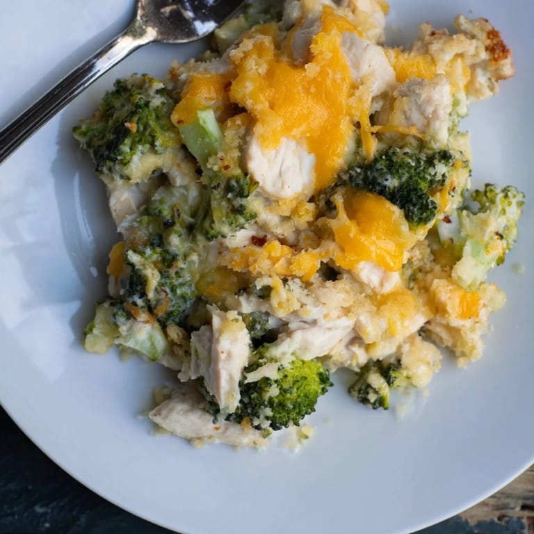 Comforting Chicken & Broccoli Cheddar Bake served warm for a delightful family dinner.  
