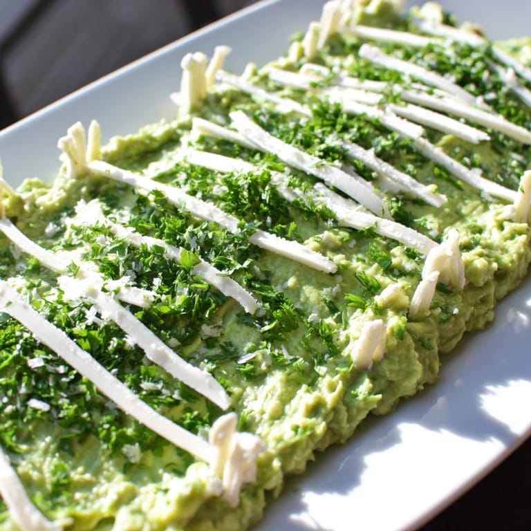 A fun, festive Game Day Football Field Snack Board with mozzarella yard lines and delicious dippers.